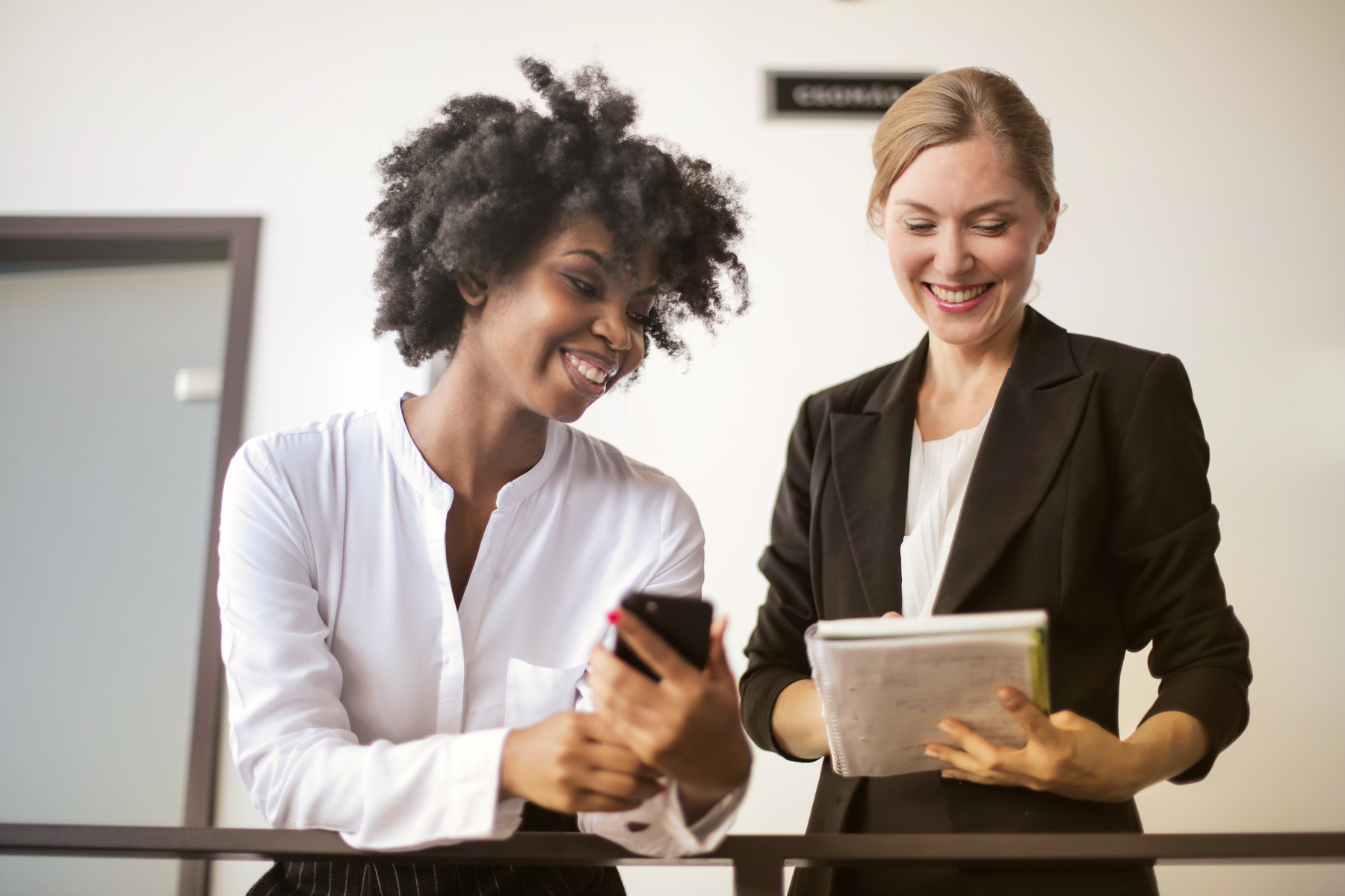 Two coworkers talking
